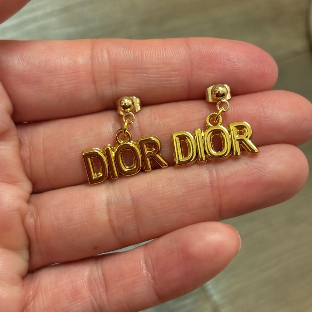 Gold dior earrings
